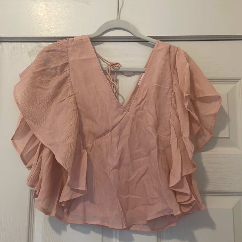 Flowy pink top with low back
